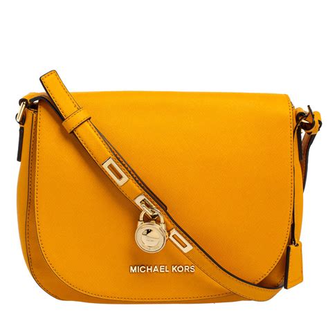 mustard clutch bag michael kors|Michael Kors wristlet on sale.